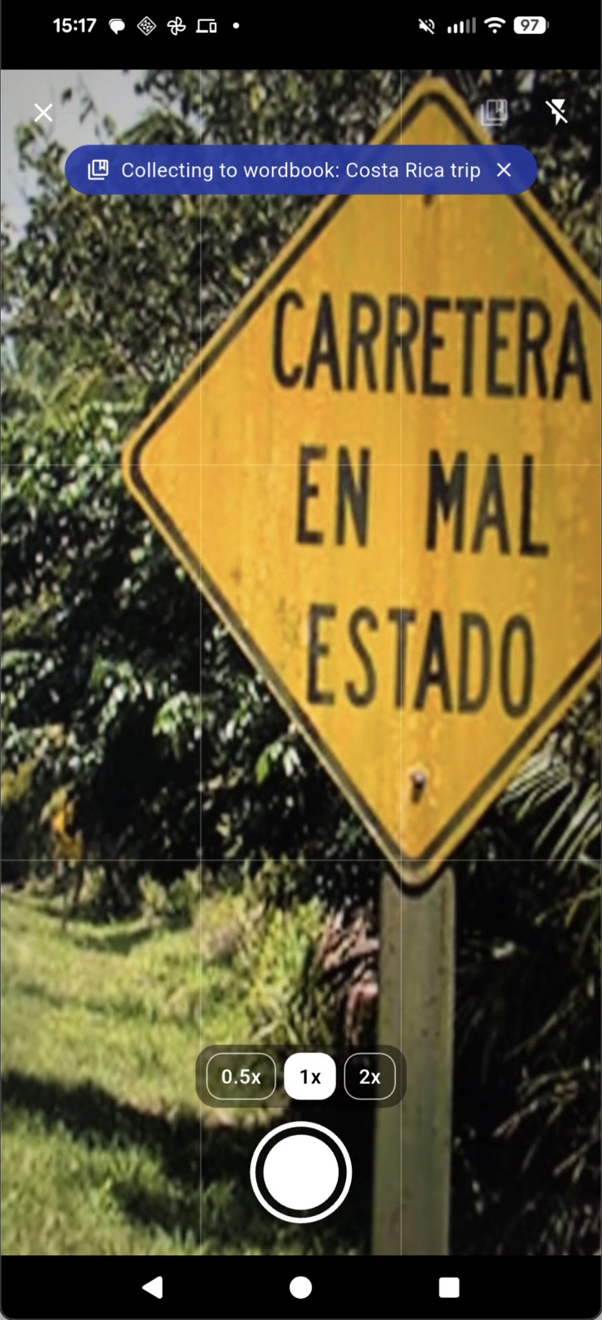 SnapVerbo camera capturing language in context on a Costa Rica street sign.